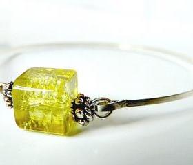 Limoncello bangle bracelet by Garden of England Jewellery, silver colour wristband with a cubic glass bead combined with tibetan silver spacers